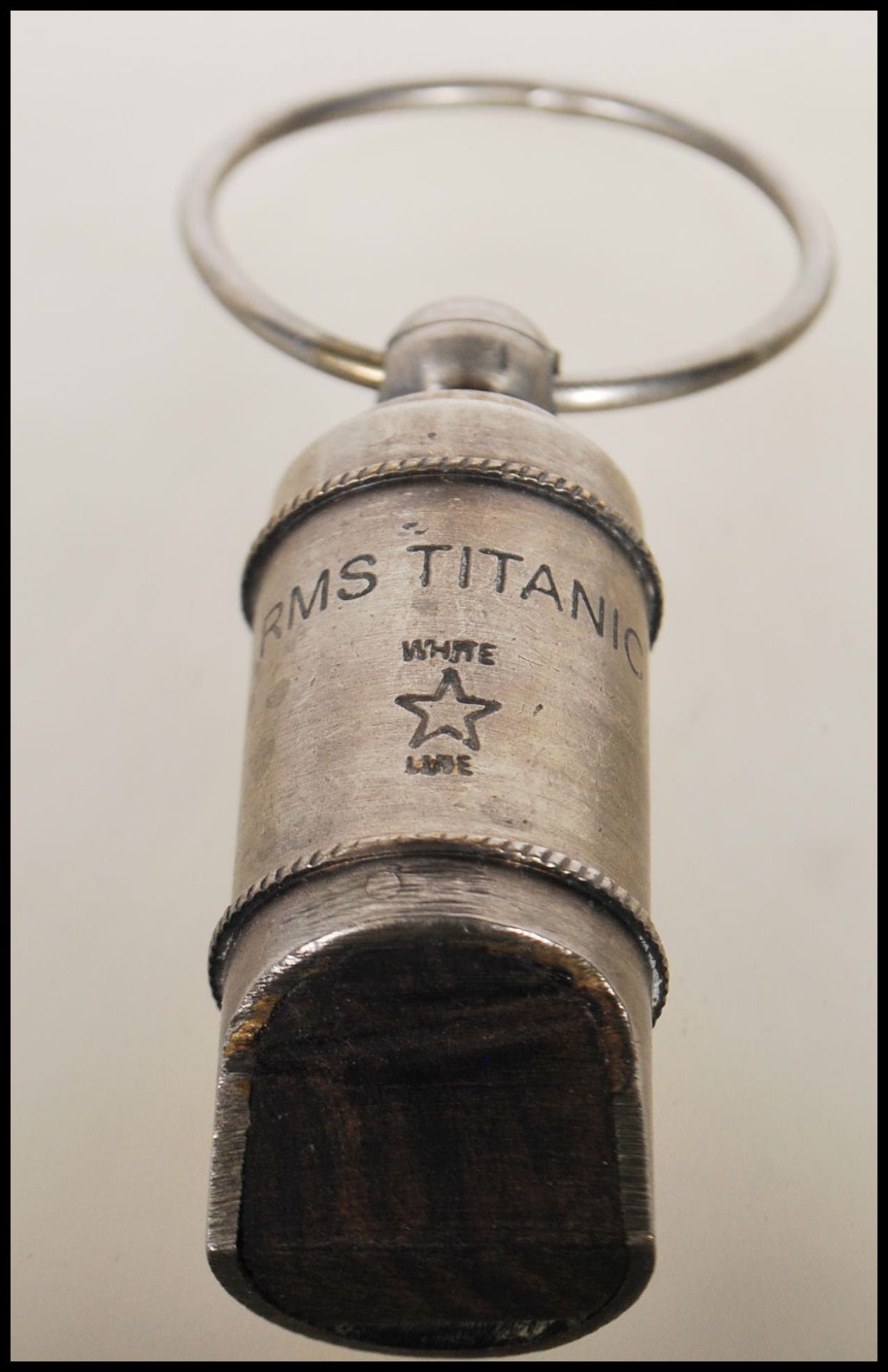 A reproduction White Star Line officers whistle stamped for 'RMS Titanic' by Auld of Glasgow. - Image 3 of 4
