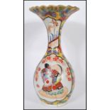 A stunning 19th Century Japanese flared famille jaune cloisonne vase, decorated with panels of
