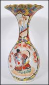 A stunning 19th Century Japanese flared famille jaune cloisonne vase, decorated with panels of