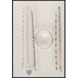 A selection of stamped 925 silver bracelets to include a bangle having raised floral decoration, a