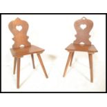 A pair of vintage 20th Century rustic country Swis