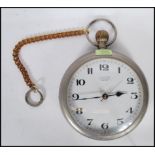 A Landex novelty wall clock in the form of an oversized pocket watch havinga white enamelled face