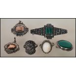 A group of silver jewellery to include a 1920's Art Deco marcasite and malachite 925 stamped brooch,