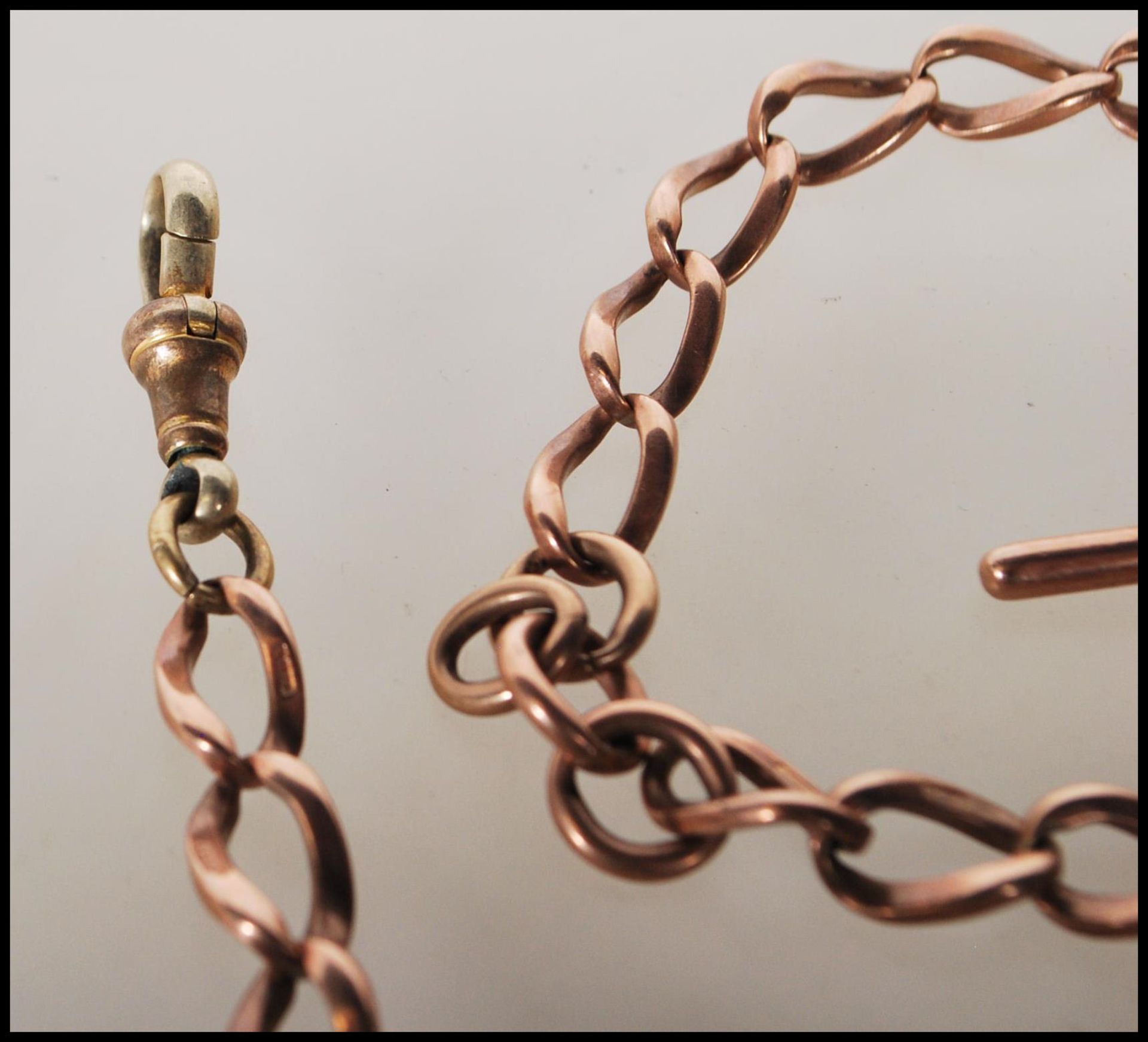 A 9ct gold curb link albert pocket fob watch chain bearing hallmark to every link and T bar, with - Image 3 of 6