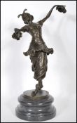 A believed early 20th century bronze Art Deco style dancing lady being signed to the base for CJR