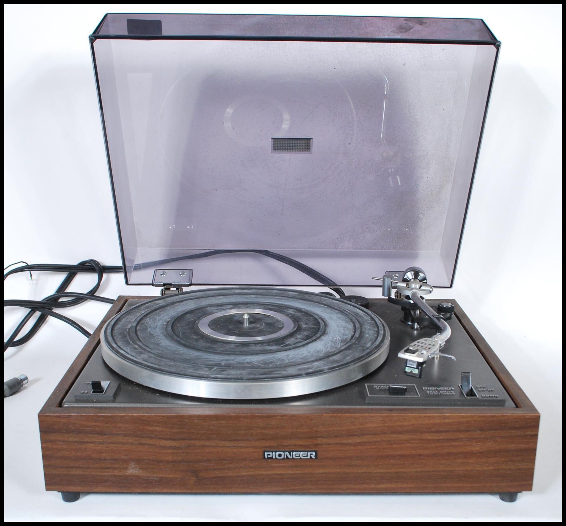 A vintage Pioneer PL 120 record player having a belt drive turntable, with overhang checker and