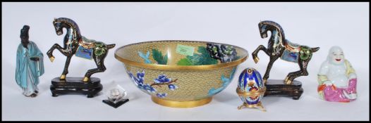 A collection of 20th Century Japanese items to include an enamelled cloisonne bowl, a pair of Tang