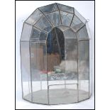 A mid 20th Century glass and lead lined wall hanging terrarium planter of demilune form, having