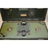 A vintage 20th Century EMI military portable reel to reel tape player recorder, green rexine covered