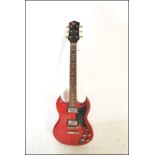 A Gibson SG style six string electric guitar by Co