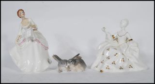 A collection of contemporary Royal Doulton Ladies in white glaze with gilt detailing, each with