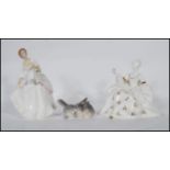 A collection of contemporary Royal Doulton Ladies in white glaze with gilt detailing, each with