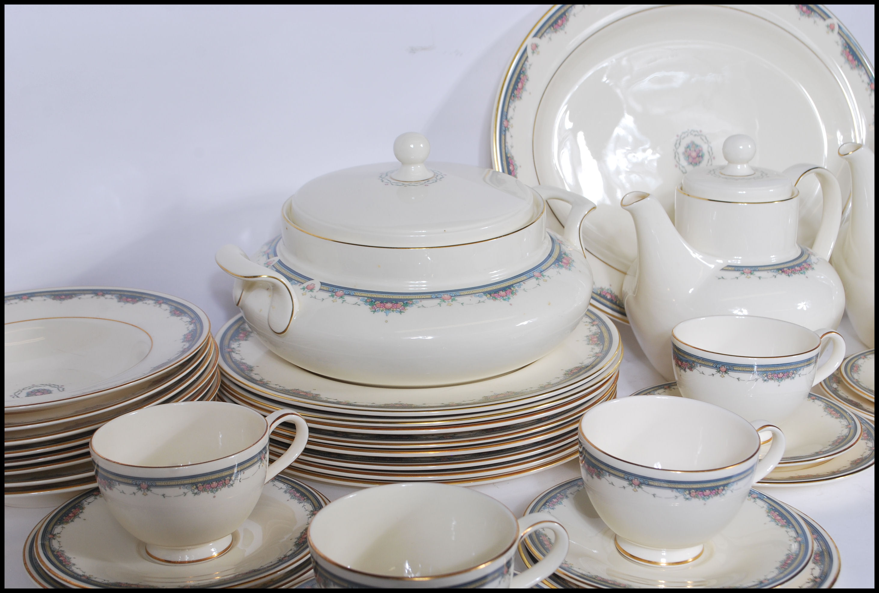 A 20th Century dinner and tea service by Royal Doulton in the Albany pattern having ivory white - Image 3 of 11