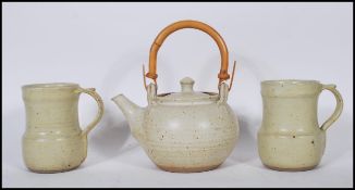 Ray Finch (1914-2012) for Winchcombe Pottery. Wood fired studio pottery teapot with matching mugs