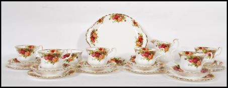 A 20th Century Old Country Roses First tea service consisting of six cups saucers and side plates,