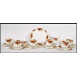 A 20th Century Old Country Roses First tea service consisting of six cups saucers and side plates,