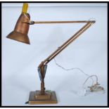 A vintage pre war Herbert Terry Anglepoise table / desk lamp in original gold painted finish.
