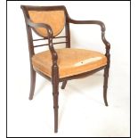A Good 19th century George III Regency mahogany desk chair. Raised on faux bamboo carved legs with