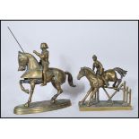 Two vintage 20th Century brass cast sculptural figurines of horses and riders, the first of a