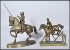 Two vintage 20th Century brass cast sculptural figurines of horses and riders, the first of a