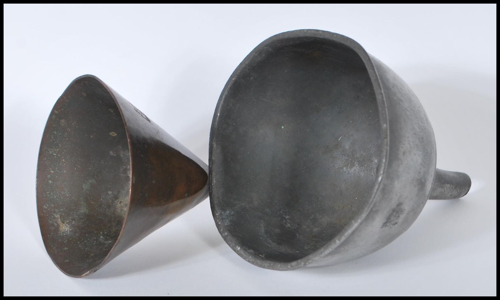 A 19th Century Georgian pewter wine funnel marked