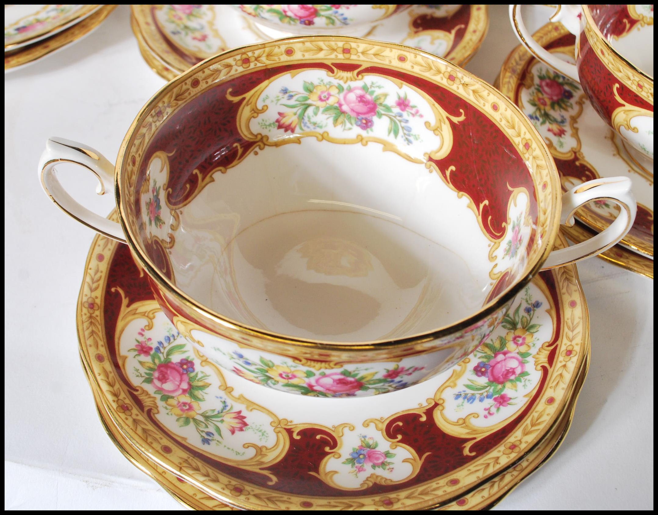 A Royal Albert bone China part dinner service in the Lady Hamilton pattern, comprising soup bowls, - Image 8 of 11