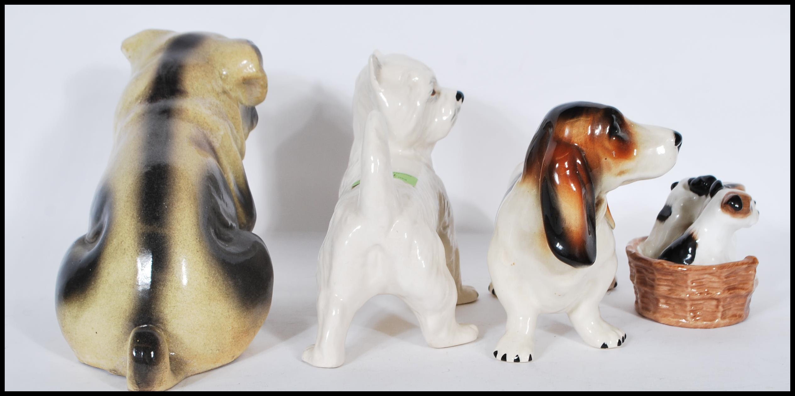 A ceramic 19th century Victorian Staffordshire figurine of a Pug dog.  Treacle glazed, of large form - Image 2 of 8