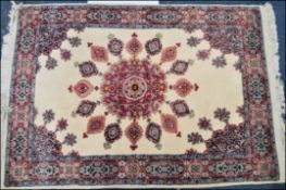 AN EARLY 20TH CENTURY PERSIAN WHITE GROUND CARPET