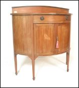 An Edwardian mahogany and satin wood inlaid  demi lune sideboard cabinet. Geometric fashion line