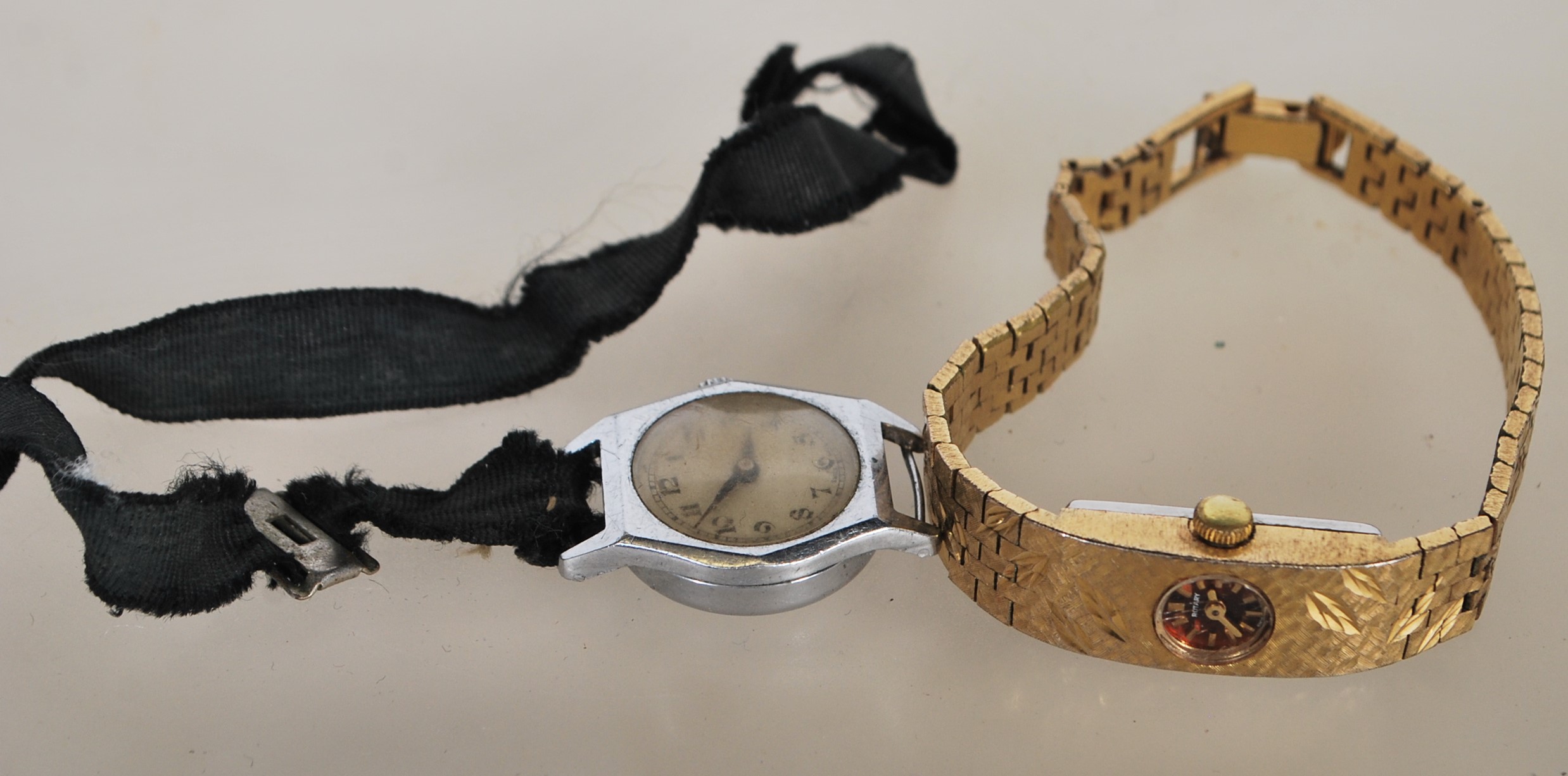 A vintage 1970's Rotary ladies wrist watch having a gold plated bark effect strap with a round brown