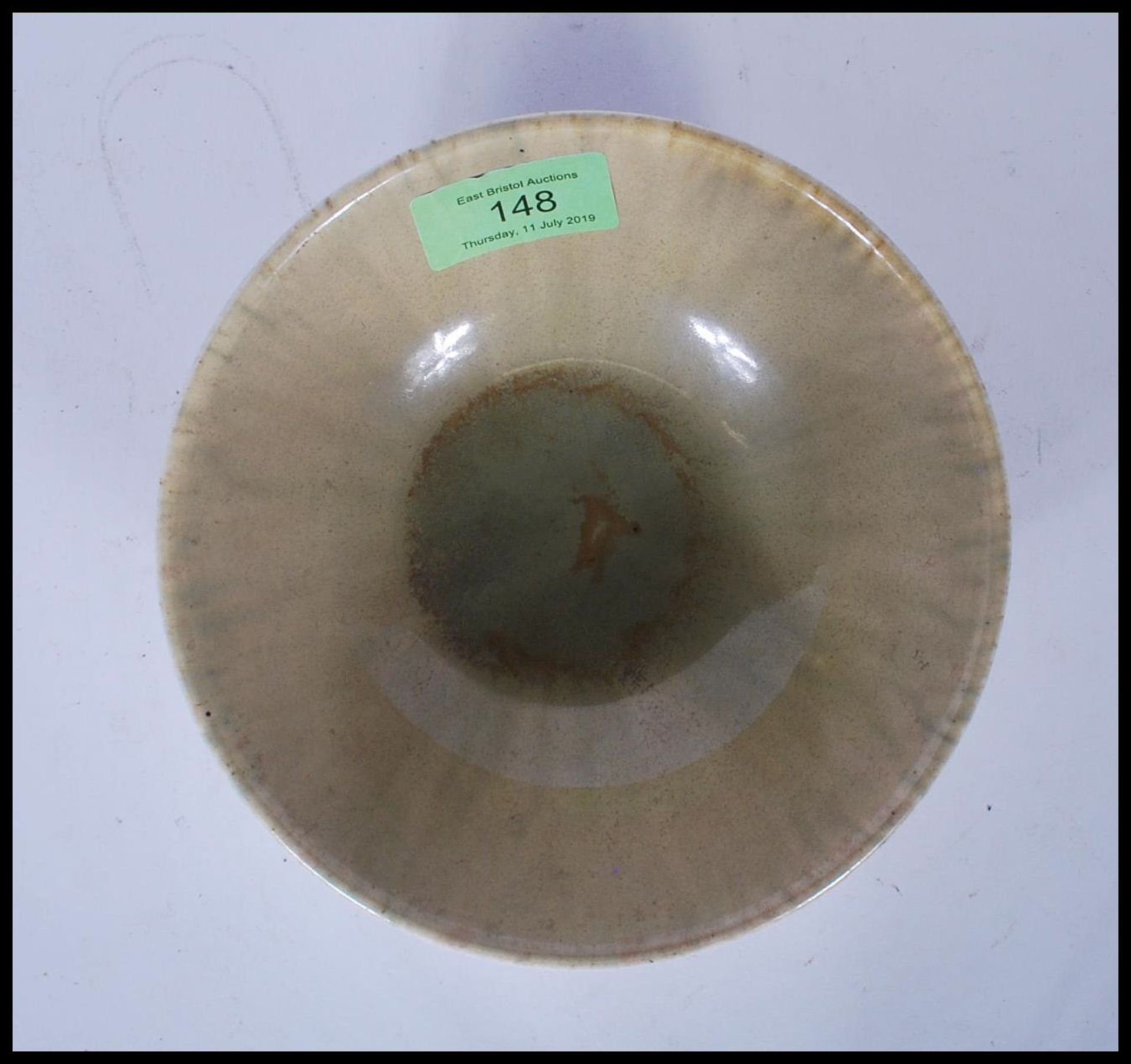 An early 20th century Ruskin Pottery bowl, with a greenish crystalline glaze being stamped 1927. - Image 3 of 5