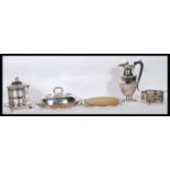 A collection of silver plated items to include a silver plated Elkington  & Co bread board, muffin