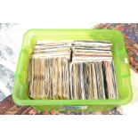 A large collection of 7" 45rpm vinyl record singles dating from the 1960's featuring several artists