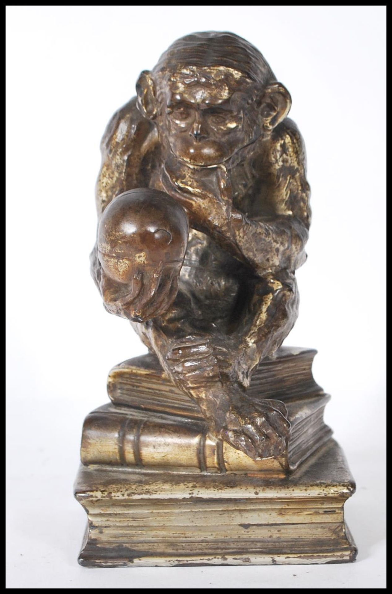 A Darwinian style cast metal novelty table cigarette / cigar lighter, in the form of a seated monkey - Image 2 of 8
