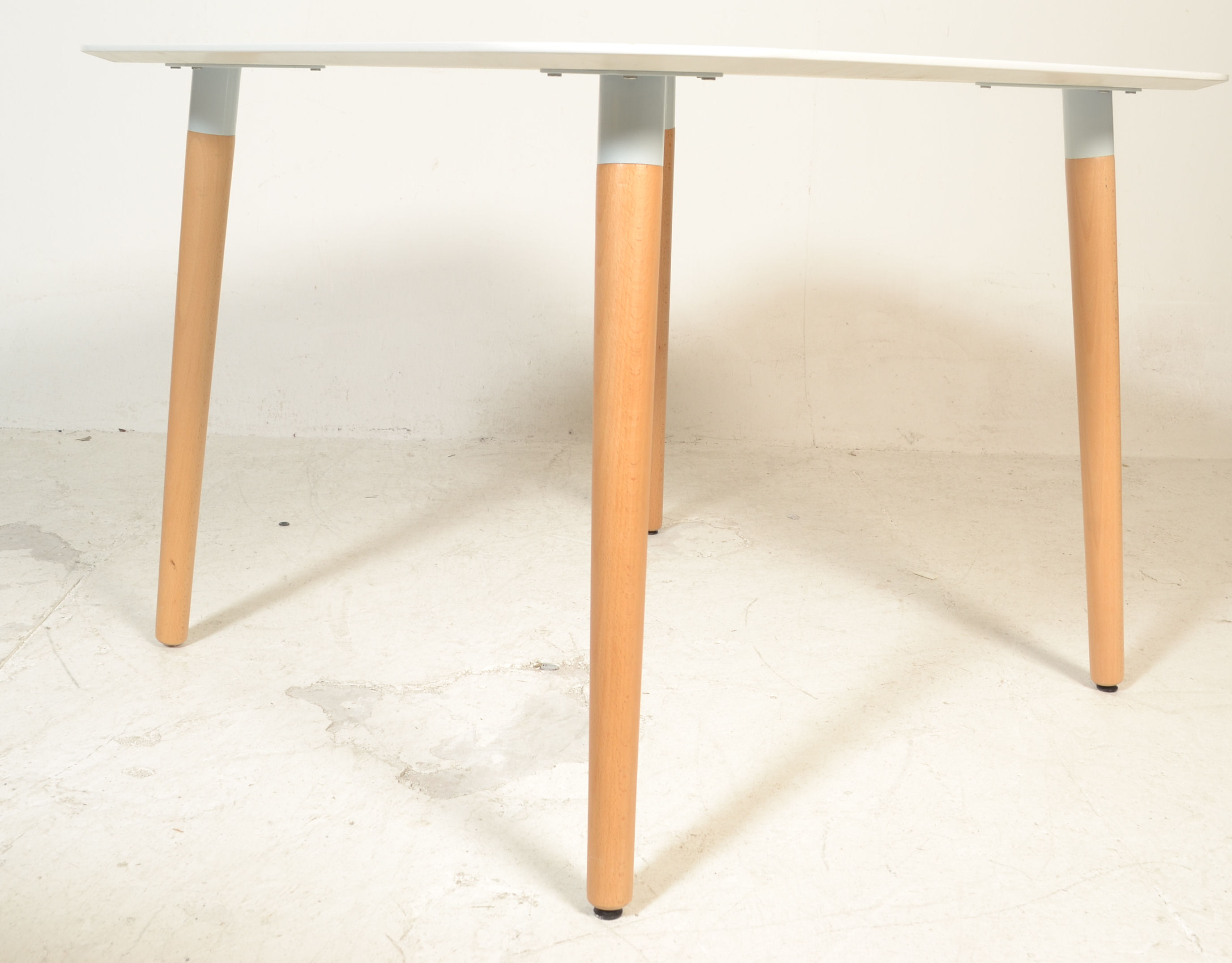 A contemporary white laminated and ash circular dining table. The table comprising of a laminated - Image 5 of 8