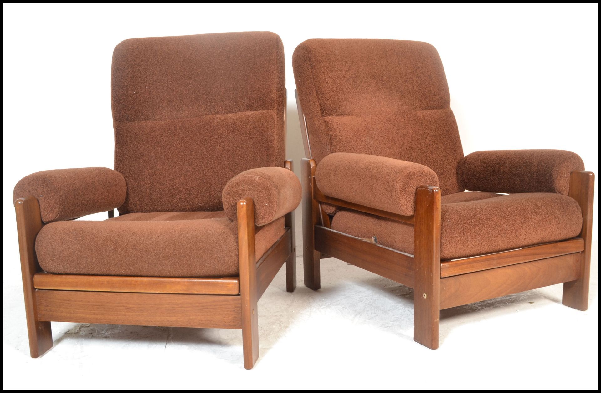 A pair of 20th Century retro vintage easy / lounge / recliner chairs / armchairs having woollen