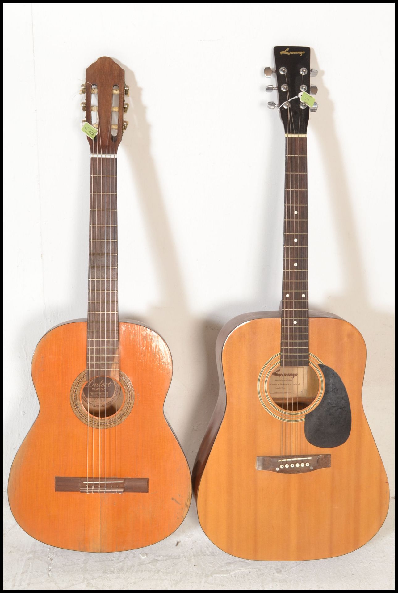 A vintage Dulcet classic six string acoustic guitar model 3057 having a shaped hollow body with