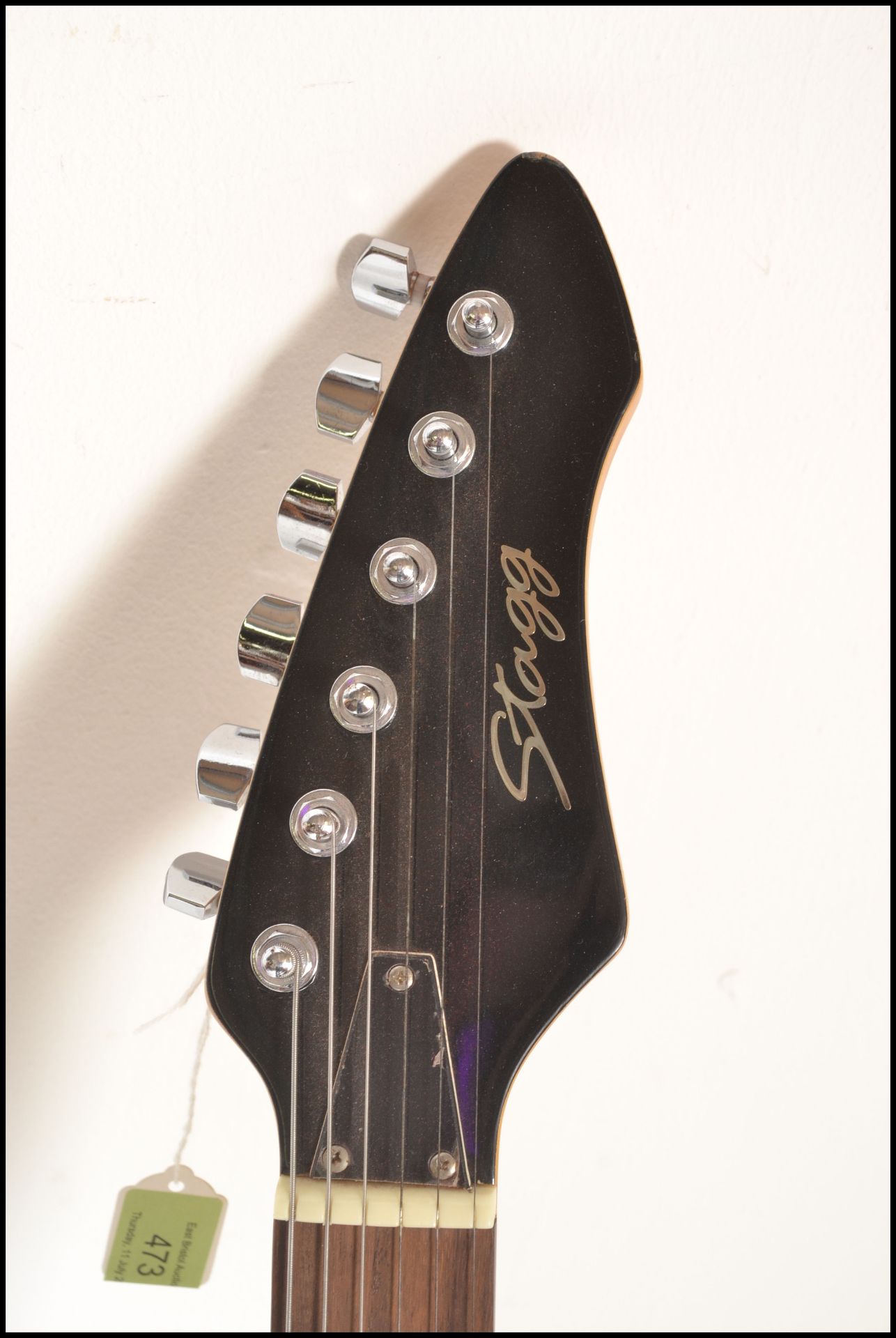 A heavy metal style six string electric guitar made by Stagg, finished in black having having chrome - Bild 2 aus 5