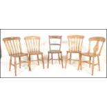 A harlequin set of 5 Victorian 19th century beech and elm dining chairs. To include Windsor style