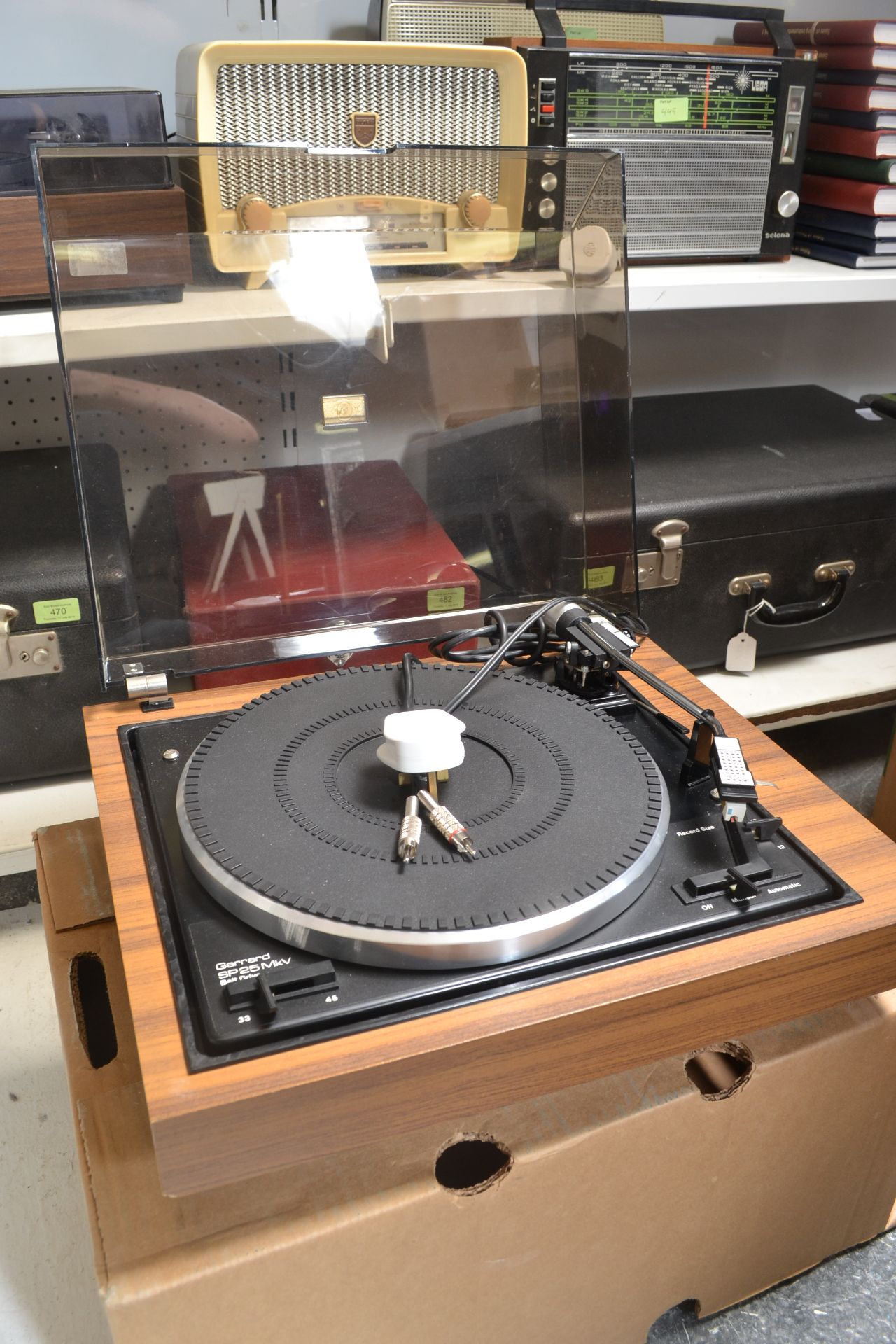 A vintage 20th Century teak cased Garrard belt drive SP 25 MK V, teak case with smoked perspex lid.