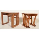 Two 20th Century retro vintage teak nest of three nesting coffee tables comprising a Parker Knoll
