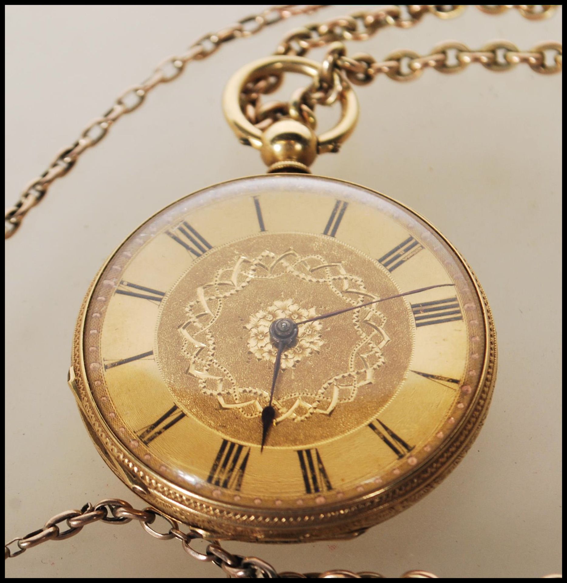 A vintage 18ct gold open faced pocket watch having a gilt face with roman numerals to the chapter - Image 2 of 7