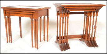 A contemporary quartetto yew wood nest of tables being raised on faux bamboo supports with splayed