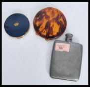 A collection of vintage compacts and lighters to i