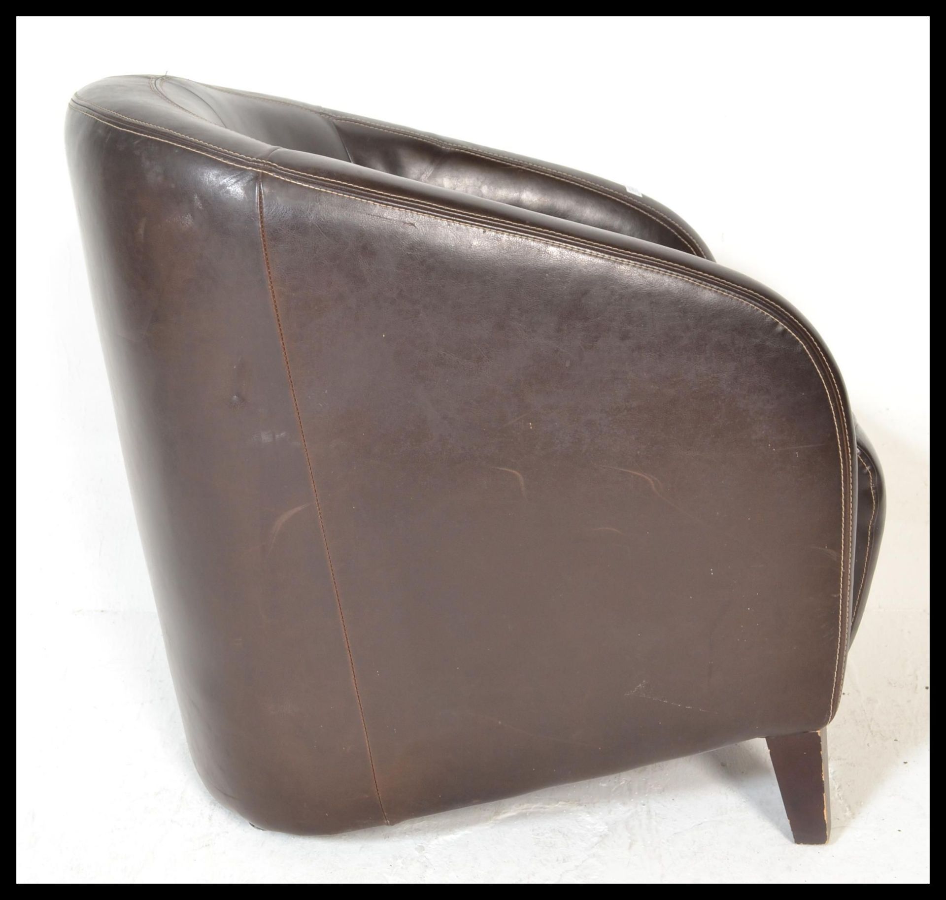 A contemporary leather tub chair / armchair. Raise - Bild 4 aus 4