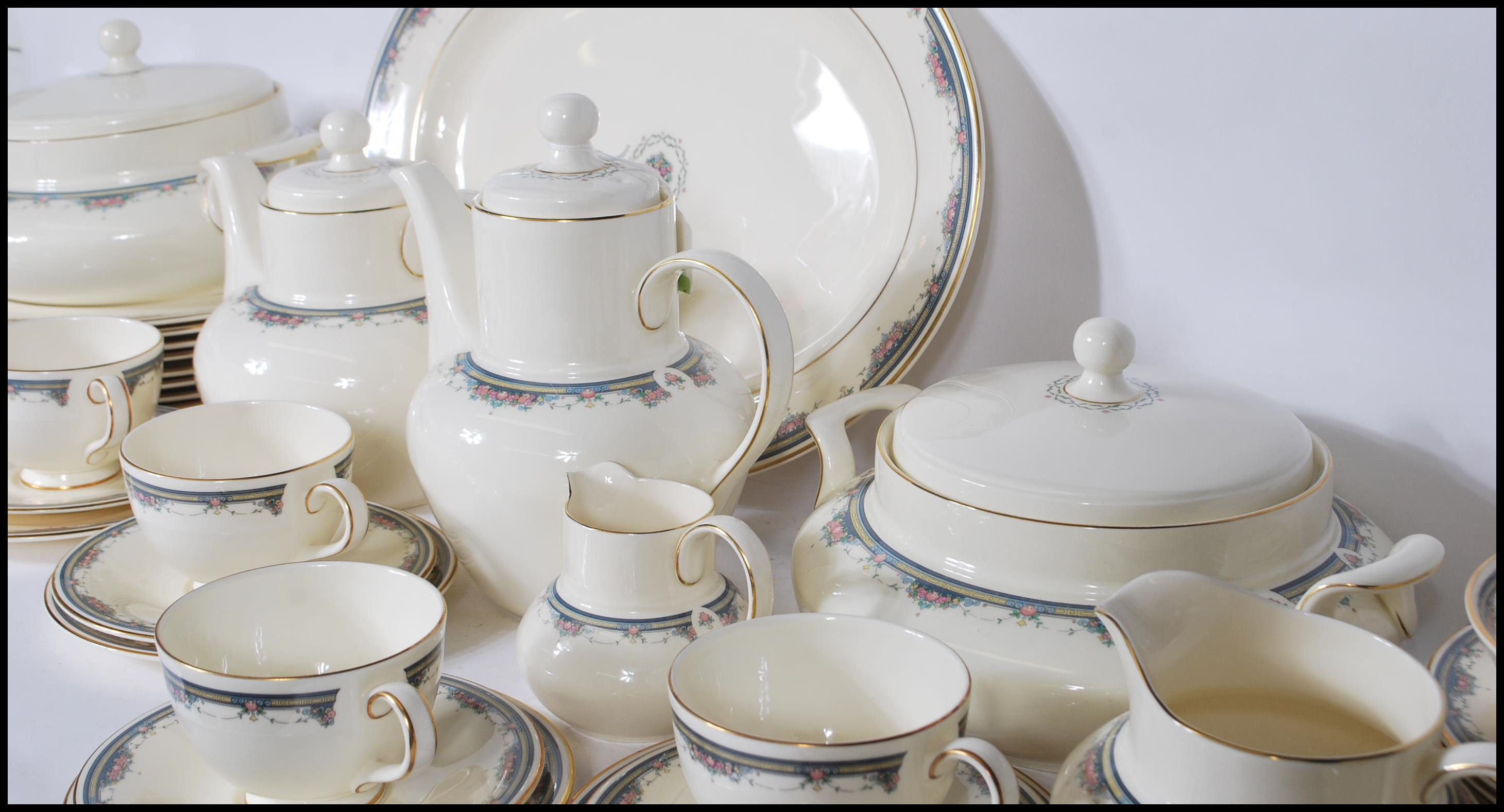 A 20th Century dinner and tea service by Royal Doulton in the Albany pattern having ivory white - Image 10 of 11