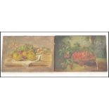 A pair of early 20th Century still life oil on canvas paintings, one depicting a basket of