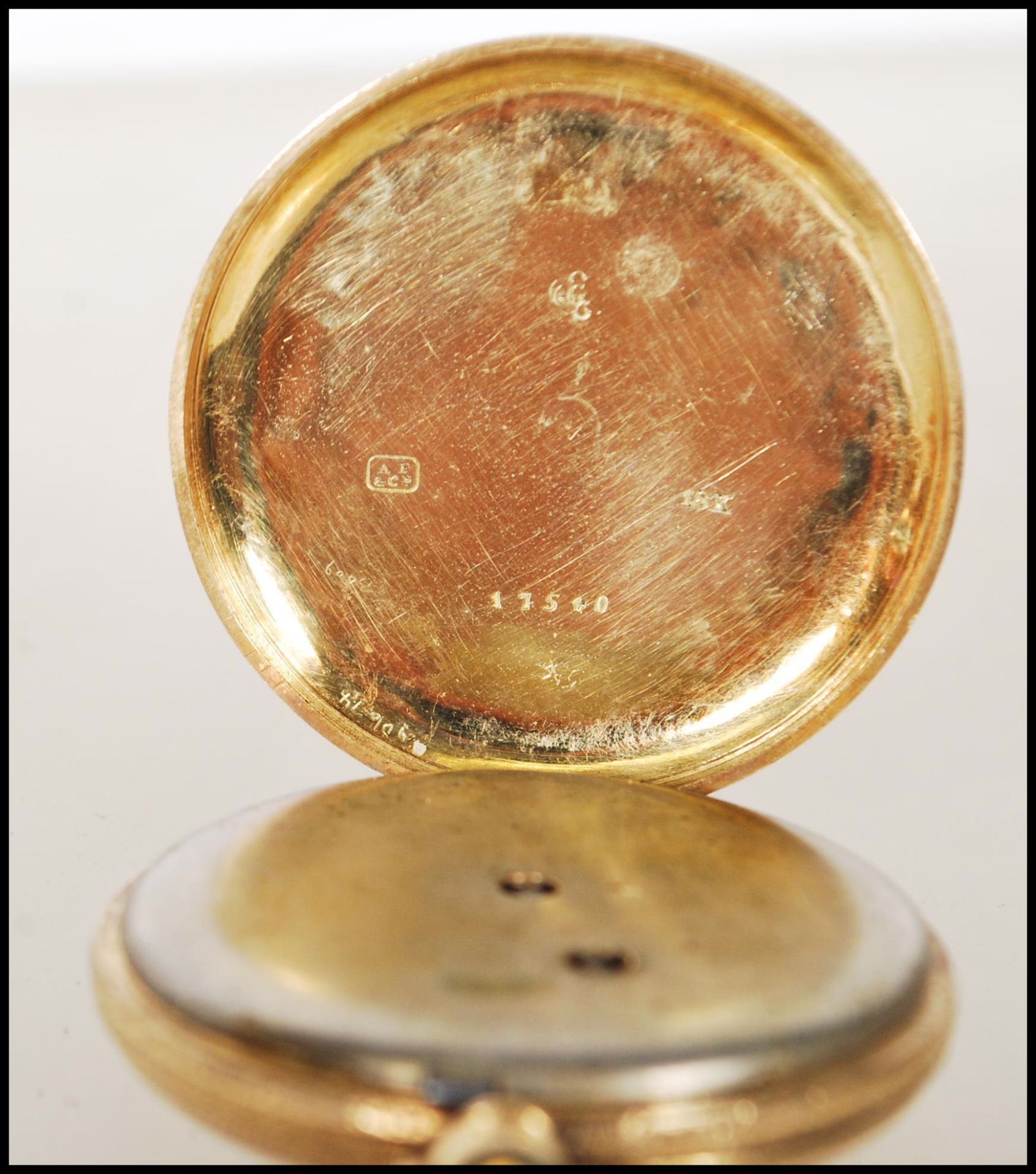 A vintage 18ct gold open faced pocket watch having a gilt face with roman numerals to the chapter - Image 5 of 7