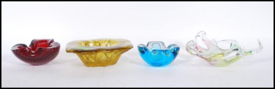 A group of 20th Century retro glass ashtrays to in