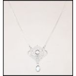 A ladies silver Belle Epoque Art Nouveau cz and opal adorned necklace pendant set to a fine linked